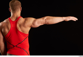 Dave  1 arm back view dressed flexing red tank…